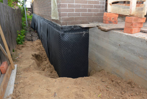 SJ Waterproofing Pros technician performing targeted Waterproofing assessment in Worthville, KY